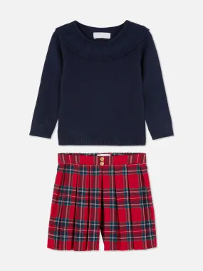Jersey con cuello con volantes y pantalones cortos